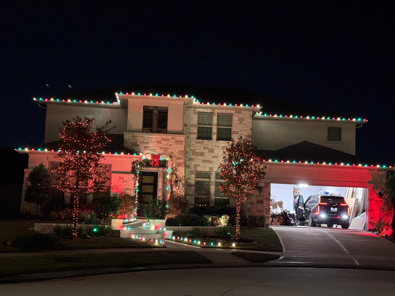 Professional Christmas light installation on a Houston-area home